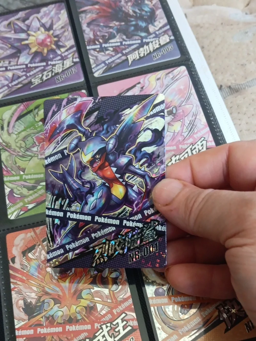 Pokemon Holographic Garchomp Card — Dark Blue, Purple, Red Accent